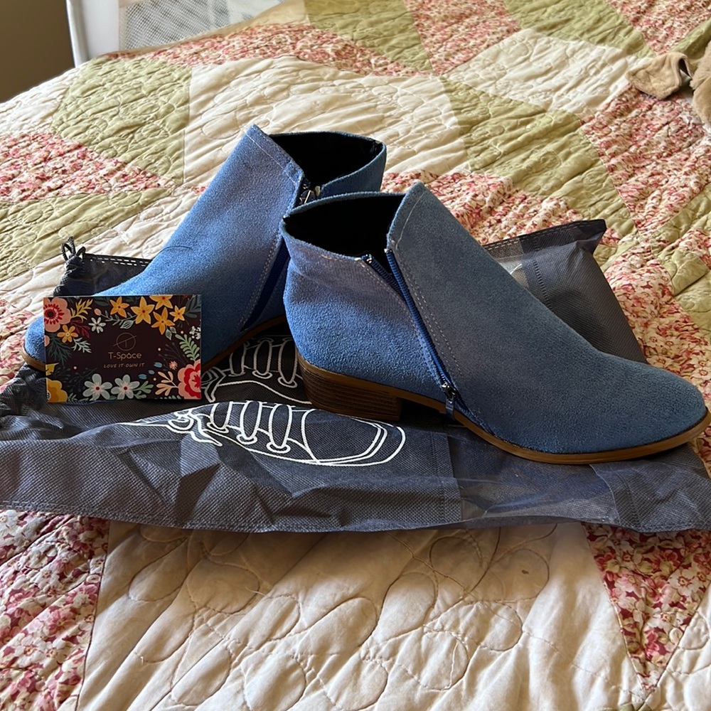 Brand new, never been worn blue low cut boots…size 9.5
